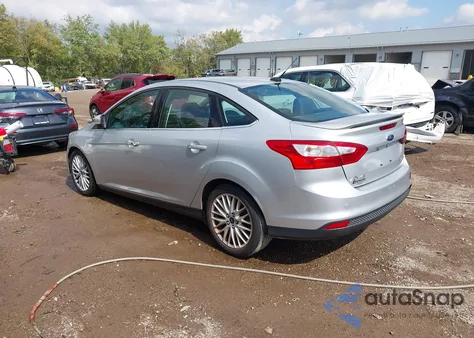 2014 Ford Focus Titanium from USA, damaged, VIN 1FADP3J28EL223087
